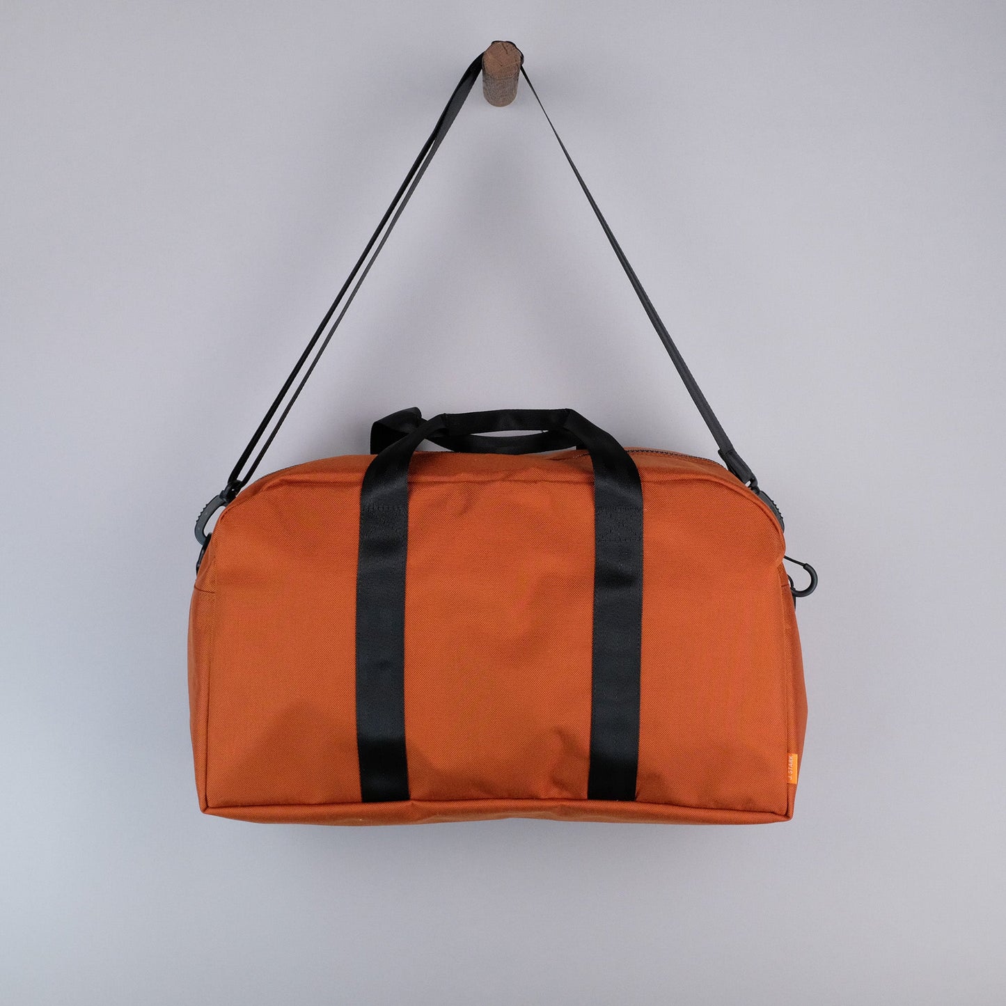 Bryant Medium Duffle Bag in Rust + Black