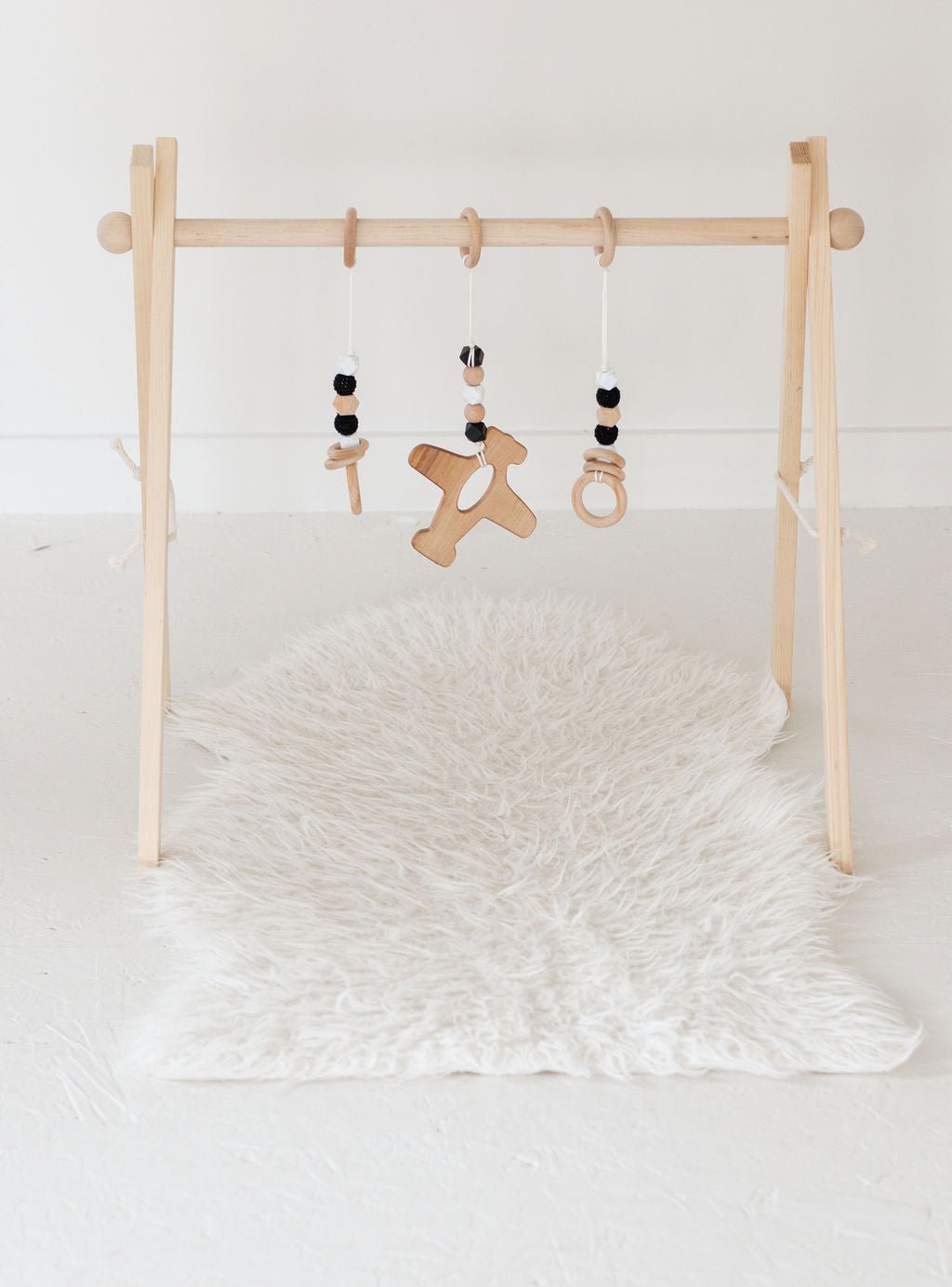 Airplane Baby Play Gym | Wooden Activity Gym - Aware House