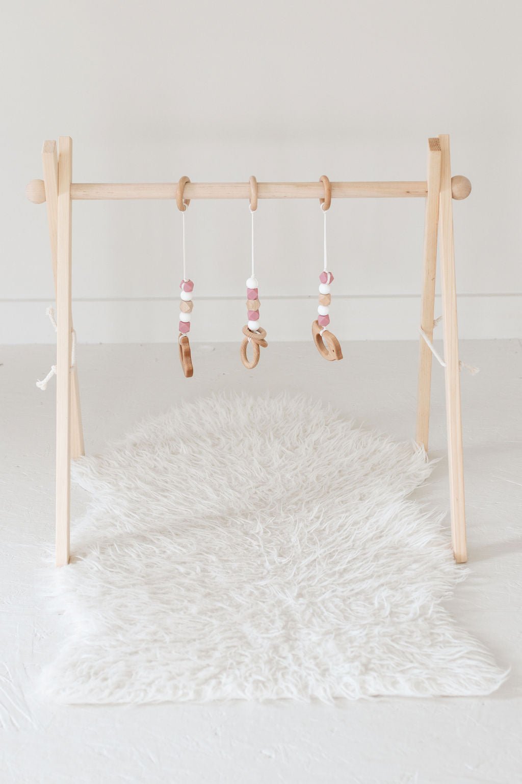 Dusty Rose Baby Play Gym | Wooden Activity Gym - Aware House