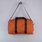Bryant Medium Duffle Bag in Rust + Black